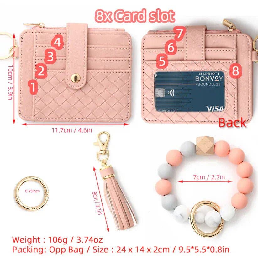 Pink wallet with card slots, keychain, and bracelet on a white background