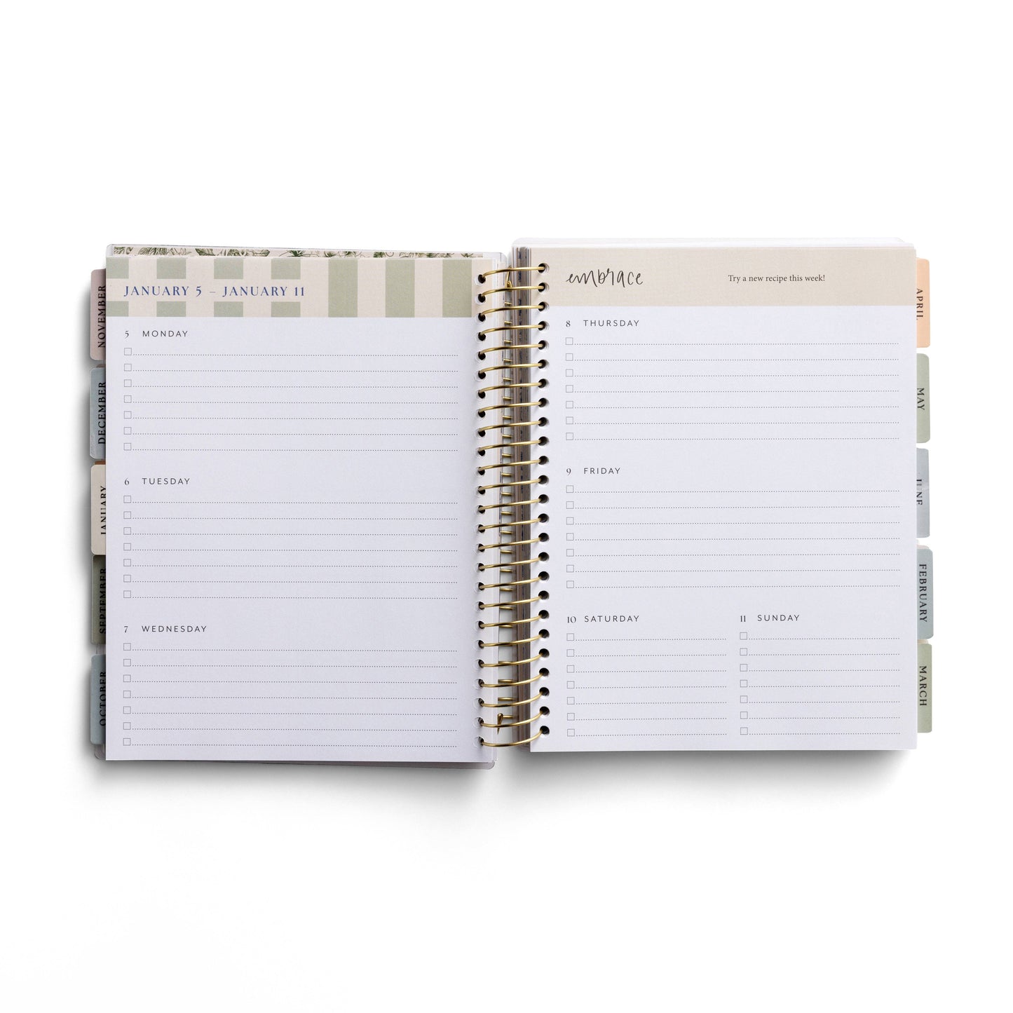 Open planner showing a weekly layout with days of the week on a white background