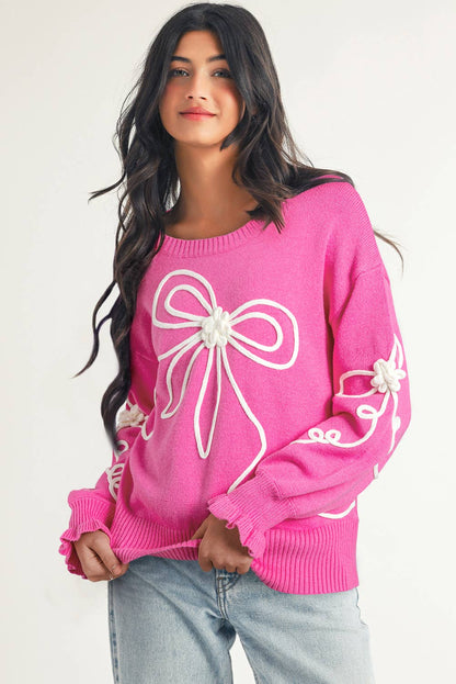 Pink corded bow sweater