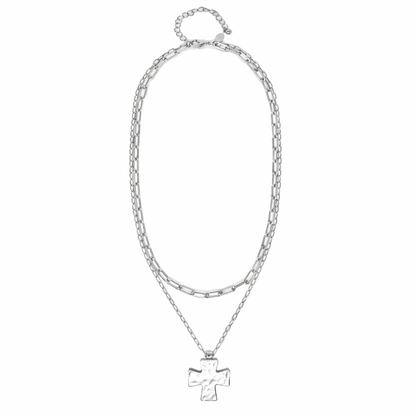 Silver necklace with a cross pendant on a white background