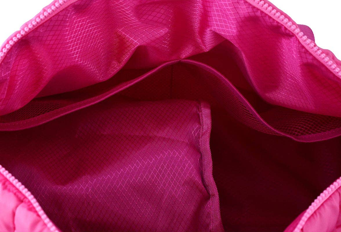 Close-up of a pink textured fabric with a zipper