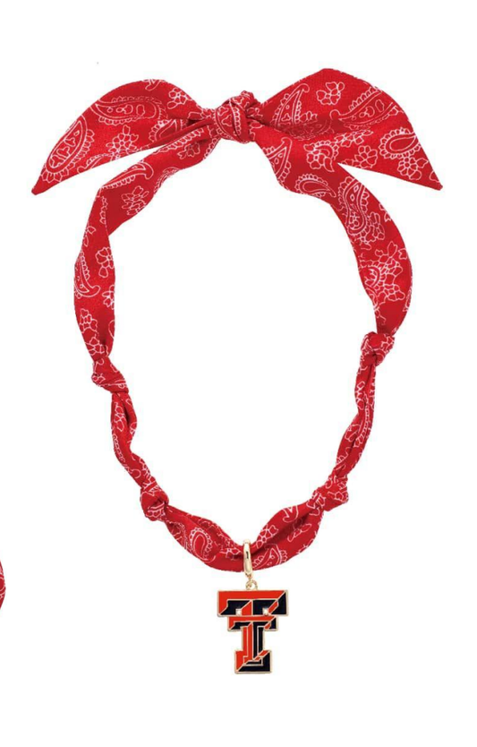 Red bandana headband with a Texas Tech logo on a white background